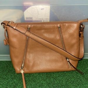 Radley London Brown leather purse with zipper accents.